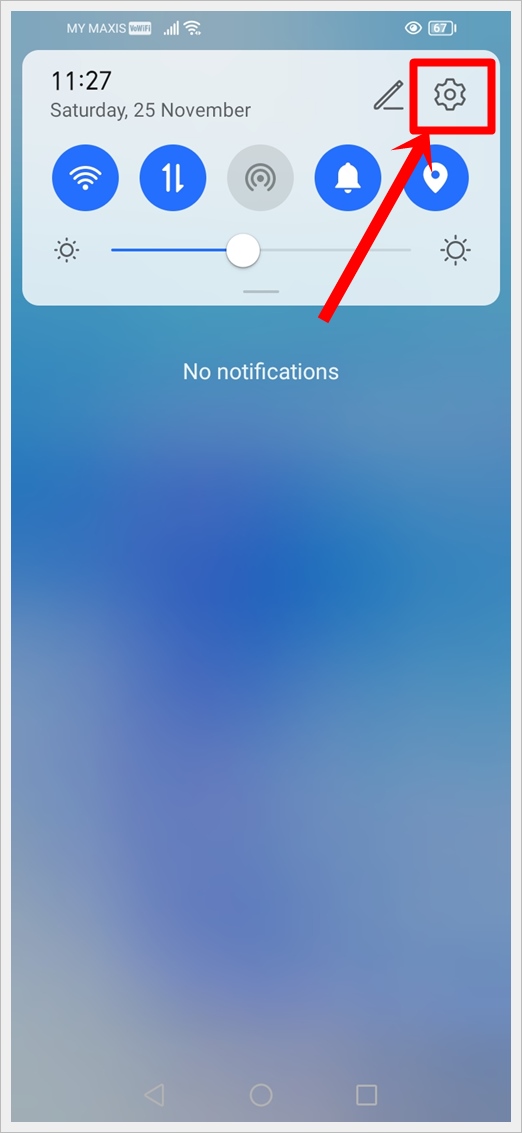 This image shows the Android quick settings panel. The Gear Icon in the top right is highlighted.