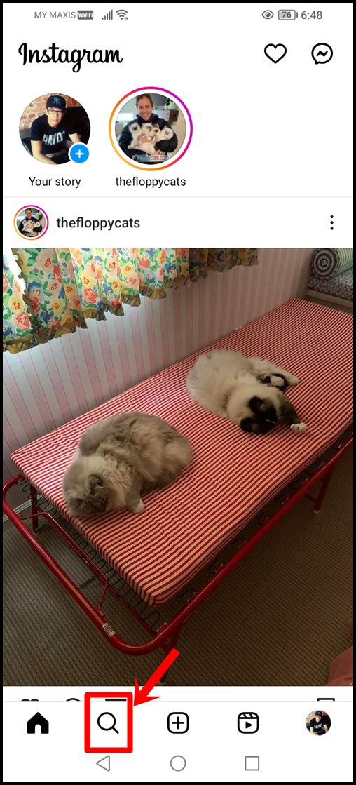 This image displays the homepage of the Instagram mobile app, with the magnifying glass icon highlighted.