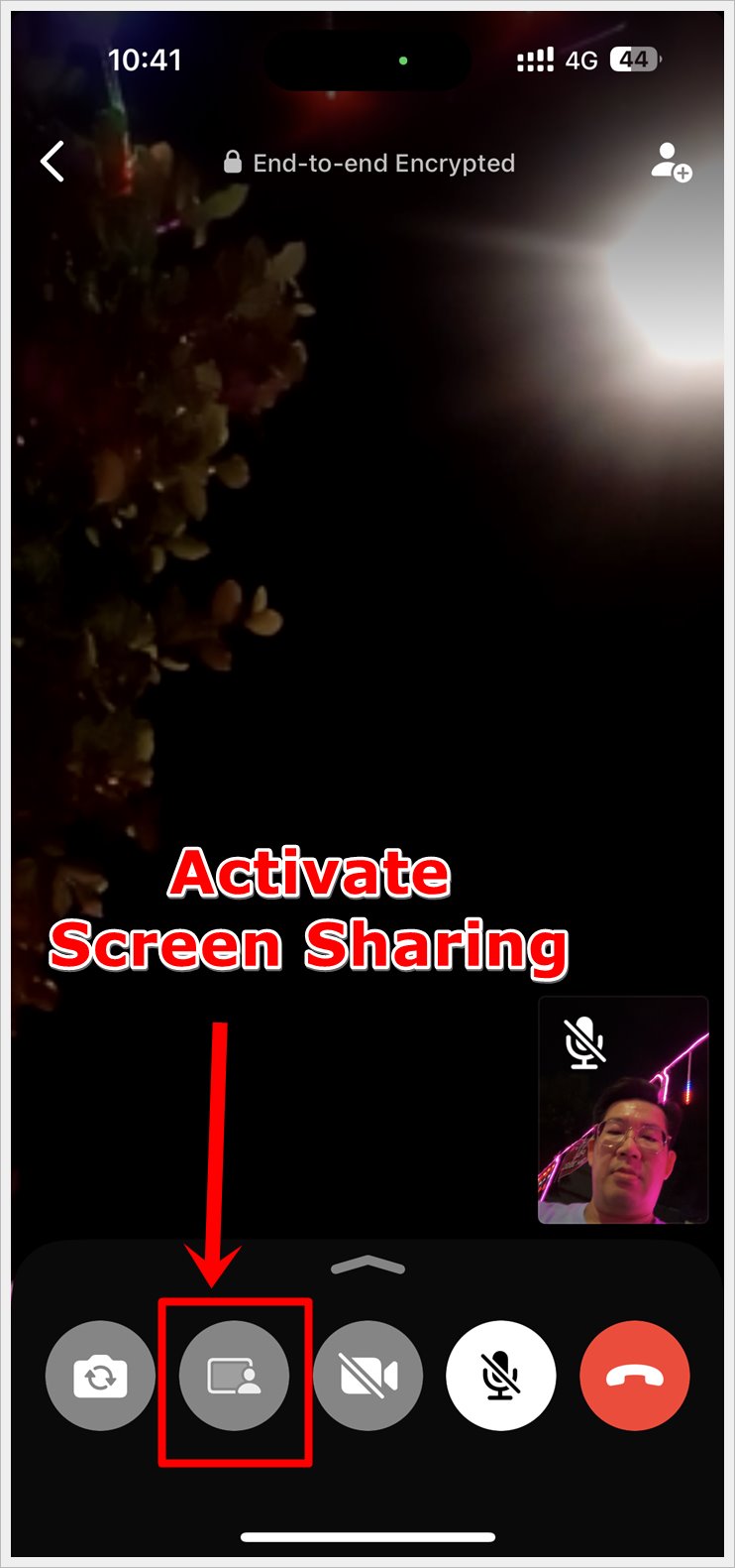 Screenshot from an iPhone displaying a WhatsApp video call window, with the 
