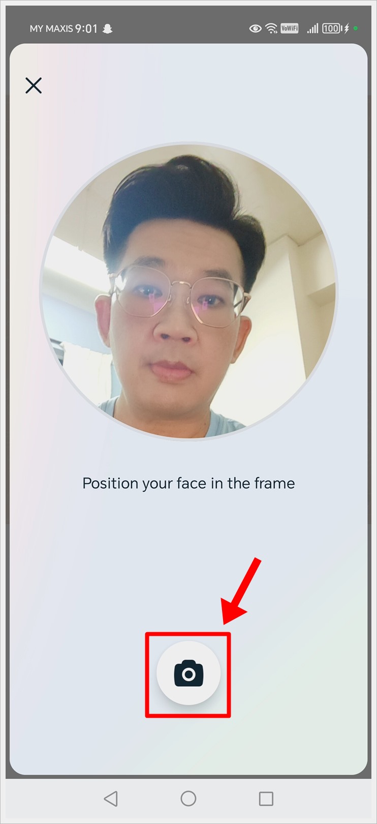 Position your face in the frame and take a photo by tapping the camera icon when you are ready.
