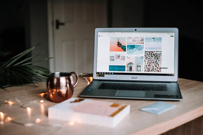 laptop-cup-book-on-table