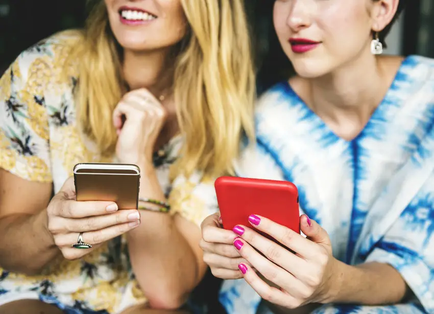 women using smartphones