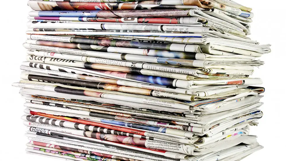 stack-of-newspapers