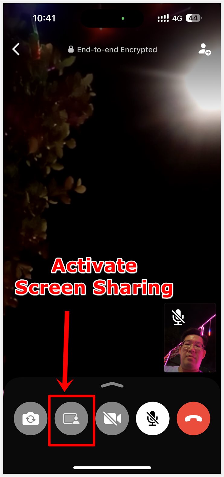 Screenshot from an iPhone displaying a WhatsApp video call window, with the 'Screen Sharing' icon highlighted to indicate the option to enable screen sharing with the contact.