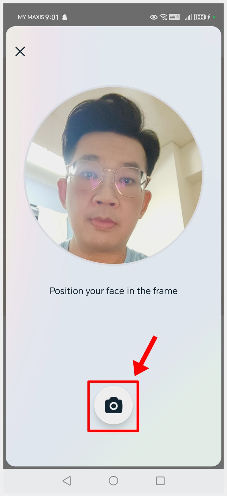 Position your face in the frame and take a photo by tapping the camera icon when you are ready.